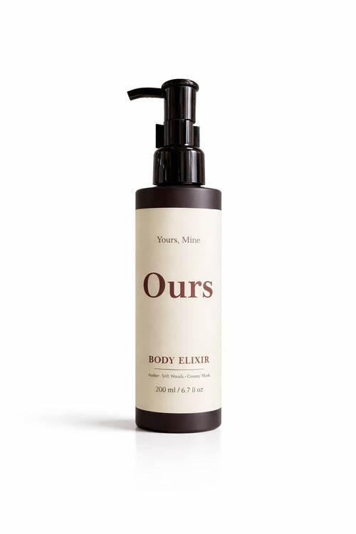 Bottle of 'Ours' Body Elixir on a white background